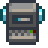 The sprite of a Dwarf Gadget, a small grey box with blue nodes on either side and a keypad across the bottom